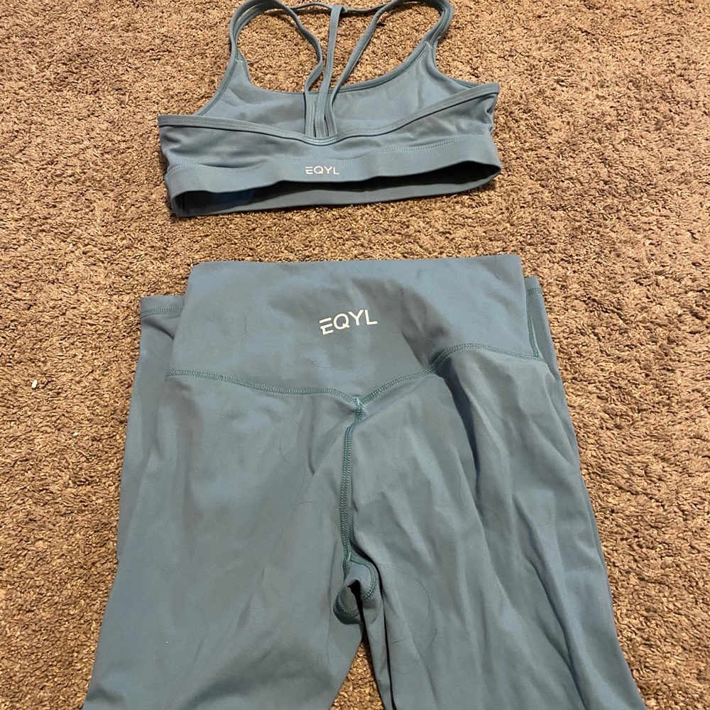 EQYL active wear set in turquoise size small.